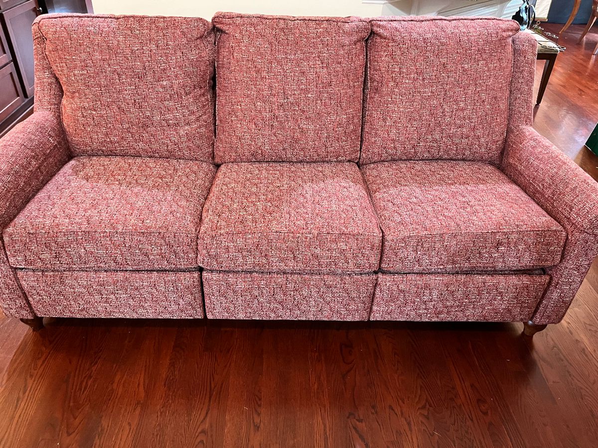 This is a Bassett power recliner 84” sofa in like new condition