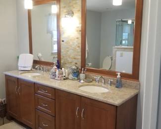 Handsome double bath vanity by Mouser Cabinetry