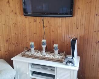 Flat screen TV with mount; white entertainment cabinet