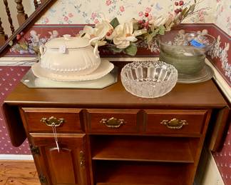 Small side buffet on wheels with fold out sides 
