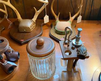vintage pipe stands and lots of pipes