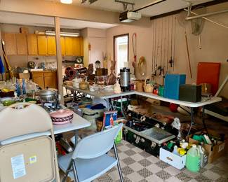 Full garage, lots of stuff tools, fishing poles, sleeting bags 