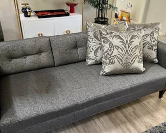 Costume upholstered sofa