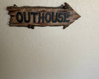 outhouse sign