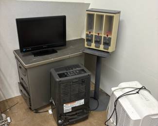 dehumidifiers, small cabinet, triple vend candy machine, tv/monitor