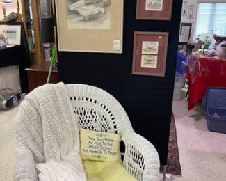 Wicker chair, magazine rack, art