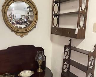 Mahogany game table, antique eagle mirror, mahogany display shelves