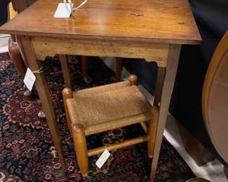 Antique pegged small table, one of two rush stools