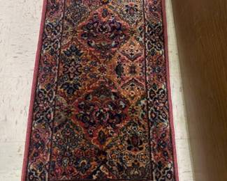 One of several small Karastan rugs