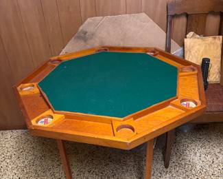 Game table with folding legs.