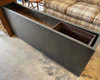 Large metal planter.