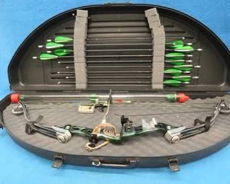 Lot 12. Hoyt Aspen Carbonite RH compound target bow. 45 lb. draw weight with a 65% let-off. Includes 12 carbon target arrows, two rests, release, and more.