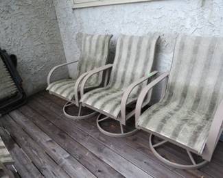 Lot 198. Three sling-back patio chairs