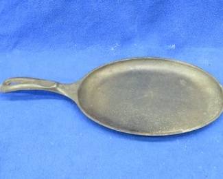 Lot 237. 10" x 7 1/2" Wagner Ware #0 Sizzle Server marked 1095 A