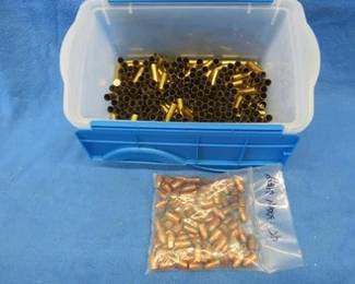 Lot 292. .45 Colt brass with spent primers and 300-grain bullets. Too many to count.