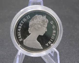 Lot 62. 1984 Canadian Proof 50% Silver Dollar with total weight of 23.3276 grams