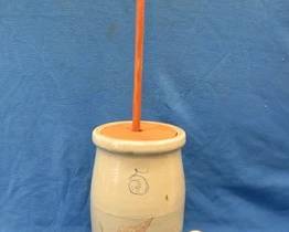 Lot 11. 5-gallon Red Wing butter churn with hairlines as pictured. Includes replacement cover and dasher.