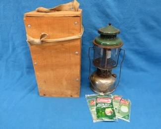 Lot 185. Late 1930s early 1940s Coleman lantern with a homemade case