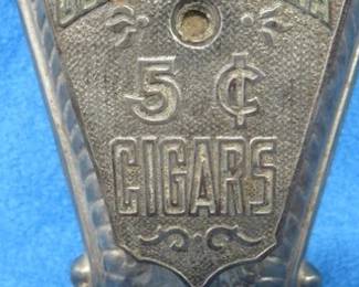 Lot 10. Antique cigar trimmer in working condition. Advertising for "Langhorne Clear Havana 5 Cent Cigars". No key included.
