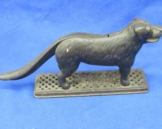 Lot 270. Vintage cast iron dog tray nutcracker by the Harper Supply Co.