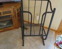Lot 138. Metal fireplace stand 35"W x 18"H x 12"D