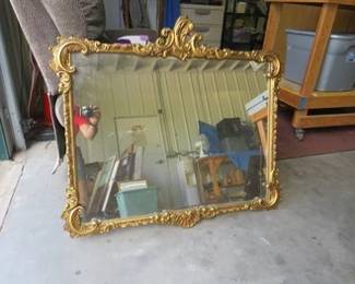 Lot 337. Large mirror in a wooden frame dated 1943. 36" x 28".
