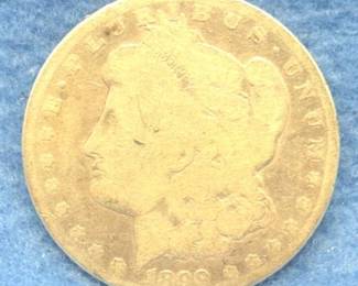Lot 313. 1899 O Morgan silver dollar