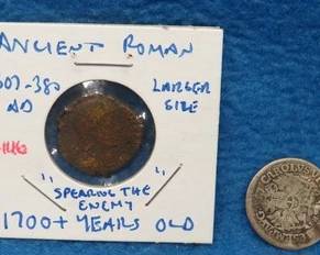 Lot 316. An ancient Roman coin and a German coin from 1727