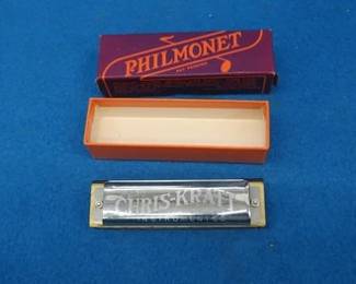 Lot 86. Chris-Kraft Philmont like-new diatonic harmonica.