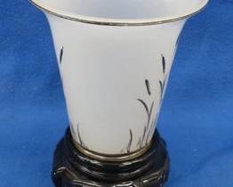 Lot 276. Beaumont silver stork art deco vase with a black base from the 1920s and 1930s.