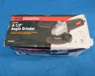 Lot 261. DrillMaster 4 1/2" angle grinder. New-in-the-box.