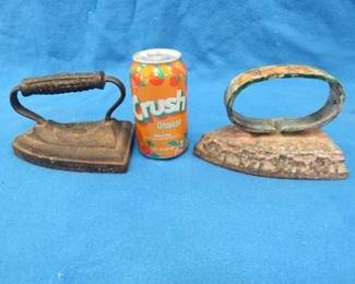 Lot 200. Two sad irons. One is marked J. Smart. The other is marked