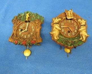 Lot 300. Two vintage wind-up clocks for parts or repair. No keys.
