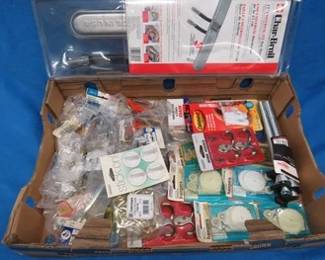 Lot 155. All new-in-the-package hardware store items including hinges, handles, grill burner, and more