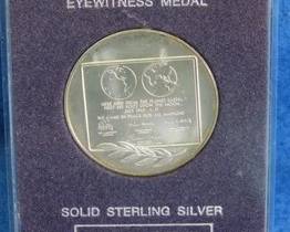 Lot 170. Franklin Mint "First Step on the Moon" sterling silver 26.21-gram coin