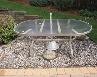 Lot 223. Glass-top patio table
