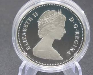 Lot 60. 1984 Canadian Proof 50% Silver Dollar with total weight of 23.3276 grams