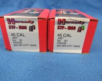 Lot 310. Hornady .45 cal. 300-grain bullets. Two full boxes of 50 each. 100 total.