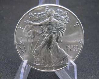 Lot 145. 2015 Silver Eagle dollar coin with one troy ounce of .999 pure silver