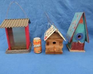 Lot 152. Two birdhouses and a bird feeder