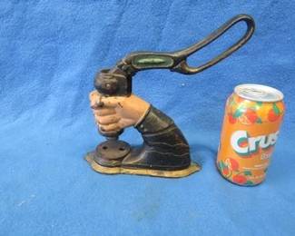 Lot 49. Antique cast iron hand-operated punch