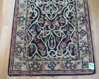 Lot 111. A pair of matching rugs, 3'6" x 5' 6" and 23" x 8"