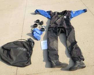 Lot 27. Bare Trilam ATR H.D. drysuit. Size medium. Includes manual, Apollo fins, Andy's drysuit undergarment, two extra pairs of gloves, and more.