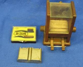 Lot 277. Vintage tin match holder, mustache care kit, and wooden toothpick dispenser