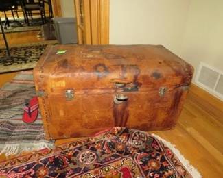 Lot 94. Old curved-top trunk, leather?