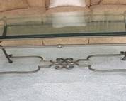 Lot 97. Glass coffee table in VGC 56"W x 33"H x 19"D