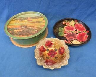Lot 28. Large metal tin, hand painted wooden serving tray, and a footed bowl