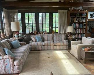 2-3 down cushion sofa's. Very comfortable and cozy. French country fabric in light blue, pink, brown and white. 1-herringbone tan/cream club chair.