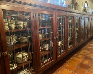One of two huge stationary cabinets with MANY sets of dishes, glassware, platters etc...used for many family and friends dinner parties. Too many to list. In addition, many unusual miscellaneous items!