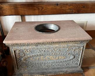 Antique ice cream freezer.